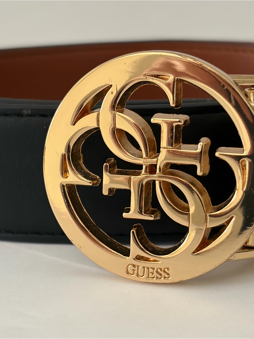 GUESS Black Women’s Belt with Gold Interlocking Logo Buckle